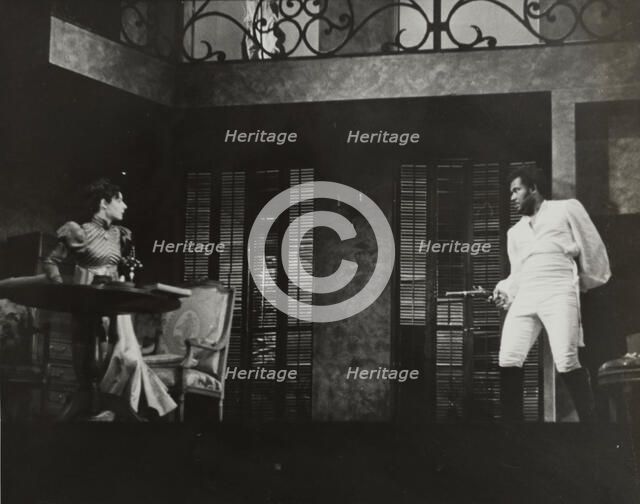 Rex Ingram pointing gun at woman, 1938. Creator: Unknown.