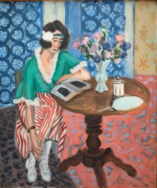 Reading woman at the table, 1921. Creator: Henri Matisse