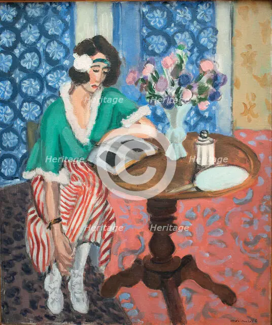 Reading woman at the table, 1921. Creator: Henri Matisse.