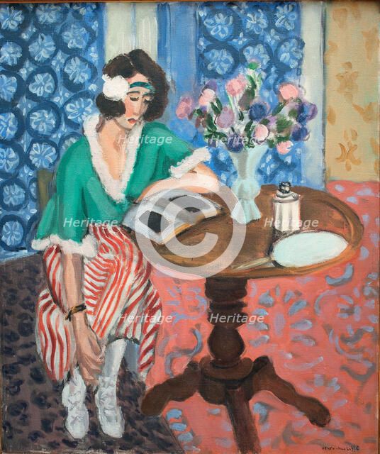 Reading woman at the table, 1921. Creator: Henri Matisse.