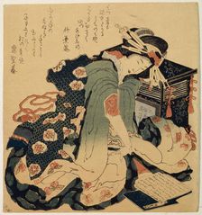 Reading c1822. Artist: Hokusai