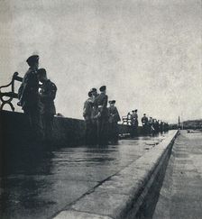 Reading signals flashed by Aldis lamp 1941. Artist: Cecil Beaton