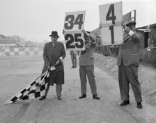 Ready to wave the chequerd flag, Brooklands. Artist: Bill Brunell