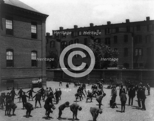 Recess period on the playground, 6th Division, (1899?). Creator: Frances Benjamin Johnston.