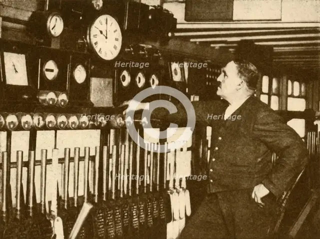 'Recording Daily Time Signal at Liverpool Street Station, London and North Eastern Railway', 1930. Creator: Topical Press Agency.