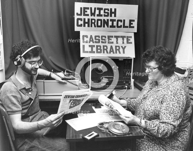 Recording the "Jewish Chronicle" cassette for the Jewish Blind Society, London, 1980. Creator: Sidney Harris.