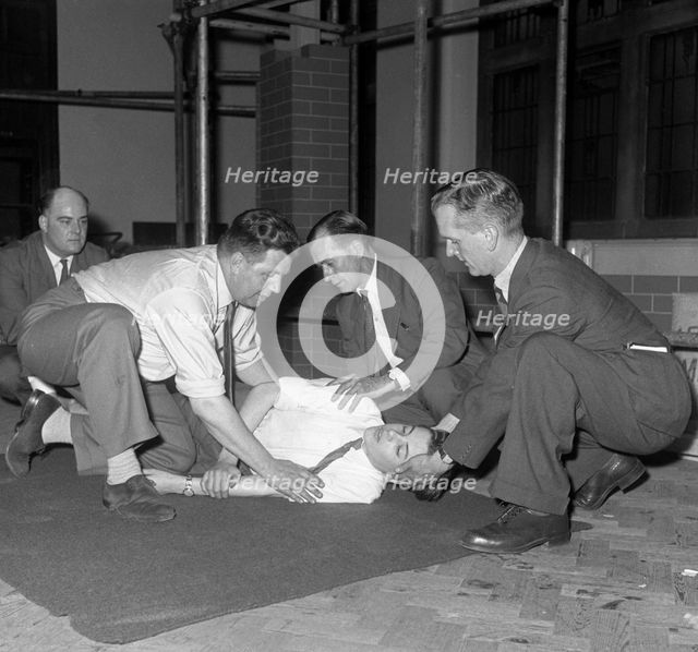 Recovery position, East Midland Gas Board training, 1961.  Creator: Michael Walters.