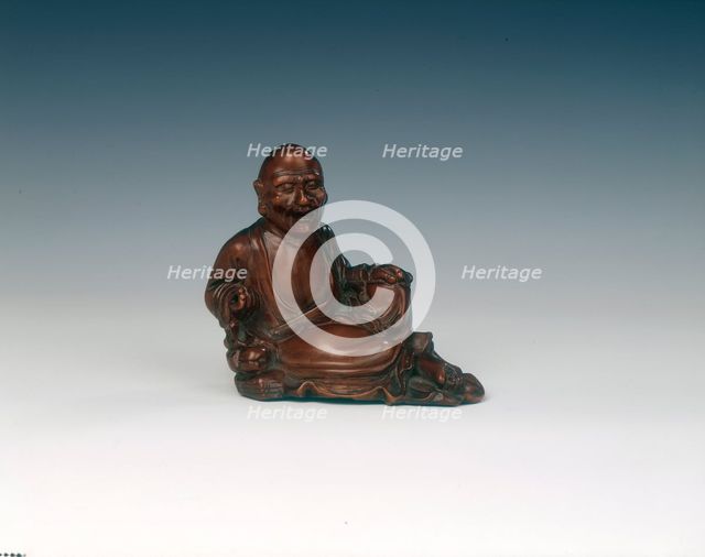 Reclining boxwood luohan figure, Qing dynasty, China, 18th century. Creator: Unknown.
