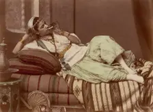 [Reclining Woman Smoking], 1870-90. Creator: Unknown