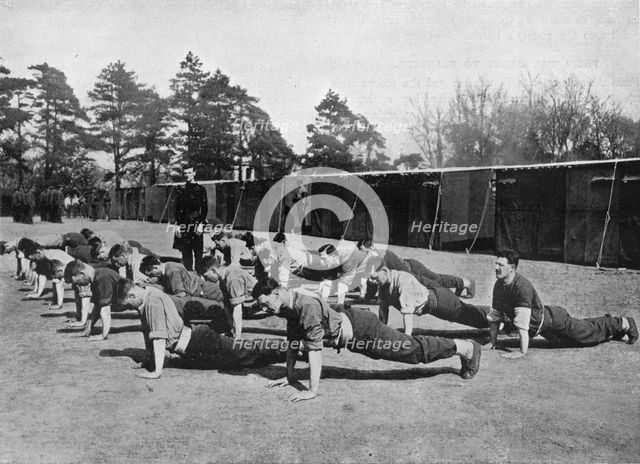 'Recruits to the Grenadier Guards at physical drill at Caterham, where the Brigade of Foot Guards de Artist: Unknown.