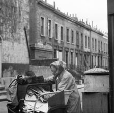 Recycling newspapers, Greater London, 1960-1965. Artist: John Gay