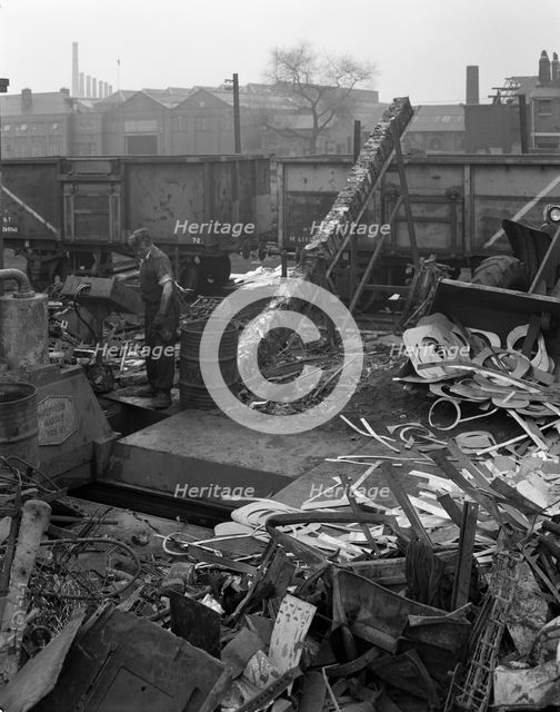 Recycling scrap, Rotherham, South Yorkshire, 1965.  Creator: Michael Walters.