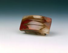 Red agate dagger scabbard slide, Western Han dynasty, China, 206 BC-8. Creator: Unknown
