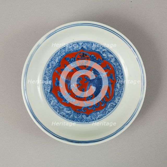 Red clobbered blue and white saucer with stork, phoenix and dragons, Jiajing (1522-1566). Creator: Unknown.