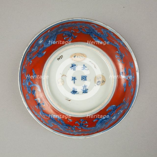Red clobbered blue and white saucer with stork, phoenix and dragons, Jiajing (1522-1566). Creator: Unknown.
