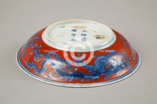 Red clobbered blue and white saucer with stork, phoenix and dragons, Jiajing (1522-1566). Creator: Unknown.