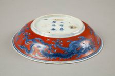 Red clobbered blue and white saucer with stork, phoenix and dragons, Jiajing (1522-1566). Creator: Unknown