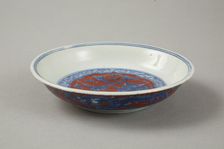 Red clobbered blue and white saucer with stork, phoenix and dragons, Jiajing (1522-1566)