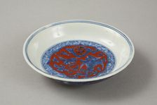 Red clobbered blue and white saucer with stork, phoenix and dragons, Jiajing (1522-1566)