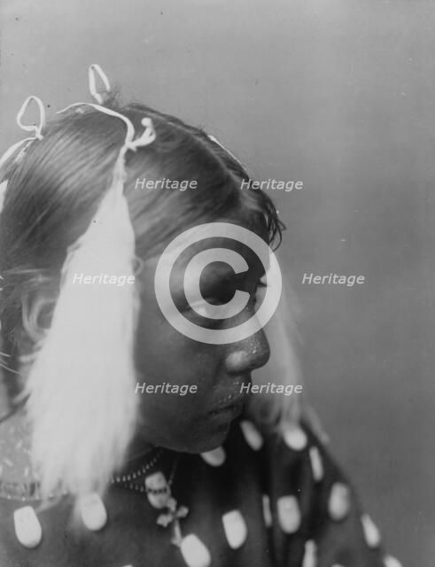 Red Cloud's granddaughter, c1907. Creator: Edward Sheriff Curtis.