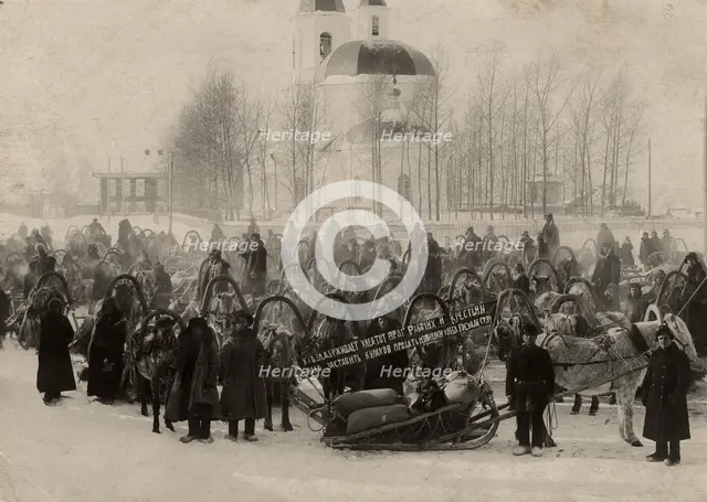 Red convoy with bread against the backdrop of the Sretenskaya Church, 1920-1929. Creator: Unknown.