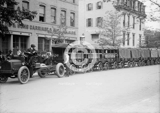 Red Cross, American - Army Trucks And Trailers For Red Cross Supplies, 1917. Creator: Harris & Ewing.