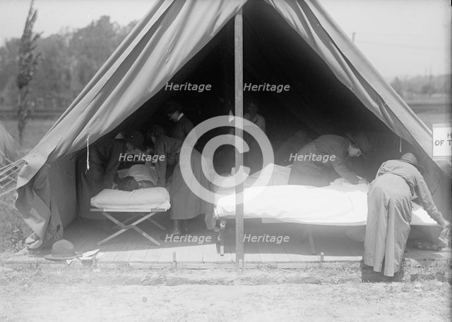Red Cross, American - Women's National Service School; Red Cross Instructions in Care of Sick, 1916. Creator: Harris & Ewing.
