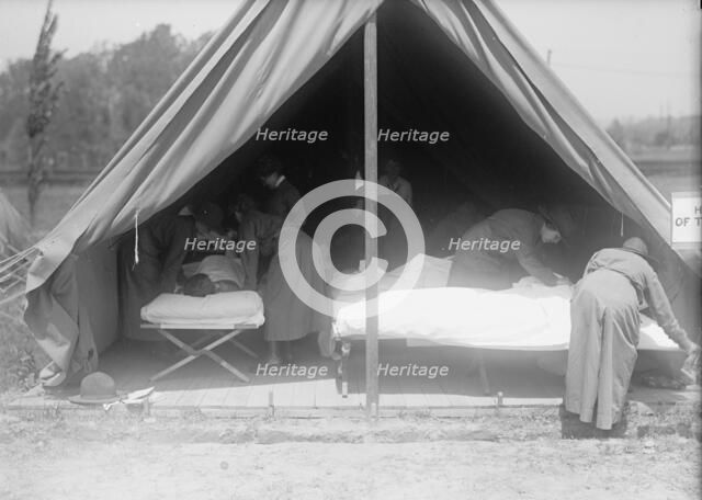 Red Cross, American - Women's National Service School; Red Cross Instructions in Care of Sick, 1916. Creator: Harris & Ewing.