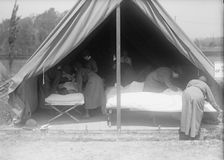 Red Cross, American - Women's National Service School; Red Cross Instructions in Care of Sick, 1916. Creator: Harris & Ewing
