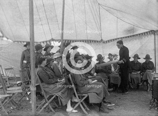 Red Cross, American - Women's National Service School; Red Cross Instructions in Care of Sick, 1916. Creator: Harris & Ewing.