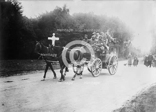 Red Cross Transport in Forest of Laigle (i.e., Laigne), 1914. Creator: Bain News Service.