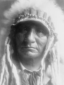 Red Hawk (Che-tan Luta)-Oglala, c1907. Creator: Edward Sheriff Curtis