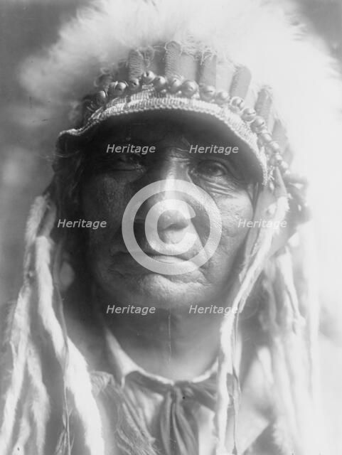 Red Hawk (Che-tan Luta)-Oglala, c1907. Creator: Edward Sheriff Curtis.