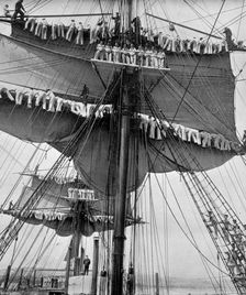 Reefing topsails on board the training ship HMS Impregnable Devonport, Devon, 1896.Artist: WM Crockett