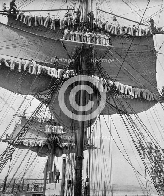 Reefing topsails on board the training ship HMS 'Impregnable', Devonport, Devon, 1896.Artist: WM Crockett