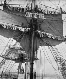 Reefing topsails on board the training ship HMS Impregnable Devonport, Devon, 1896.Artist: WM Crockett
