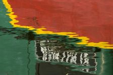 Reflections of a bantam tug at Battlebridge Basin, Regent's Canal, Camden, London, c2009. Artist: Derek Kendall