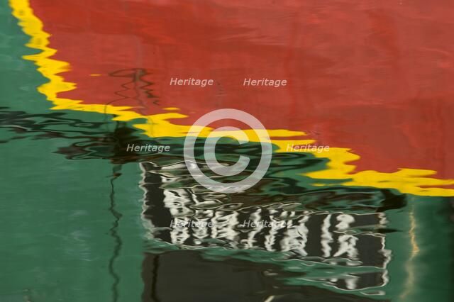 Reflections of a bantam tug at Battlebridge Basin, Regent's Canal, Camden, London, c2009.  Artist: Derek Kendall.