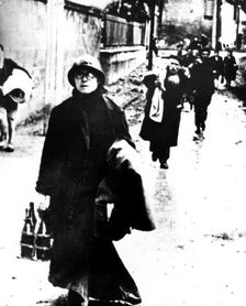 Refugees leaving a Normandy town, France, World War II, 1940-1944