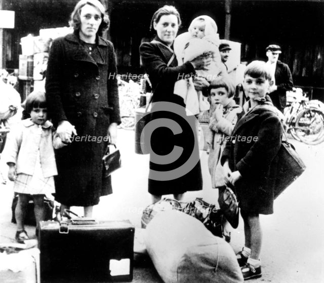 Refugees with their belongings, German-occupied Paris, July 1940. Artist: Unknown