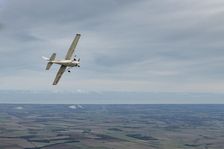 Reims-Cessna F172M Skyhawk in flight near Driffield, East Riding of Yorkshire, 2023. Creator: Chloe Pearson Jones