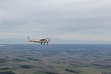 Reims-Cessna F172M Skyhawk in flight near Driffield, East Riding of Yorkshire, 2023. Creator: Chloe Pearson Jones