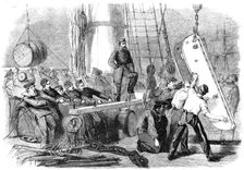 Reinforcements for Canada: shipping sledges on board the Calcutta at Woolwich for guns..., 1862. Creator: W Thomas