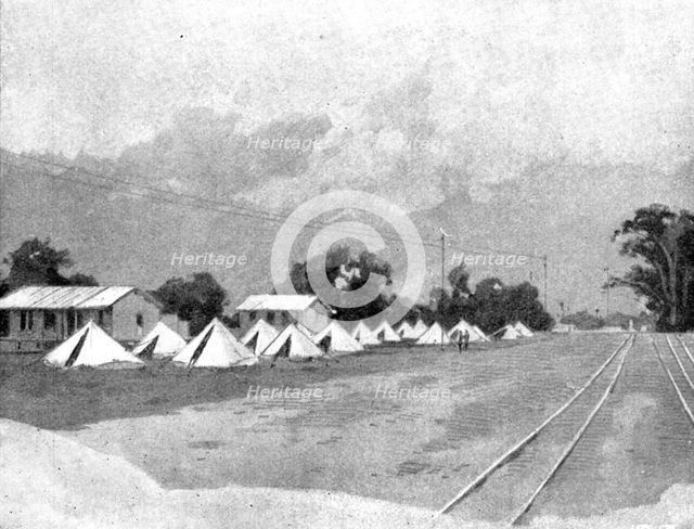 Reinforcements for Uganda: arrival of an Indian Contingent at Mombasa - the departure camp..., 1898. Creator: George Montbard.
