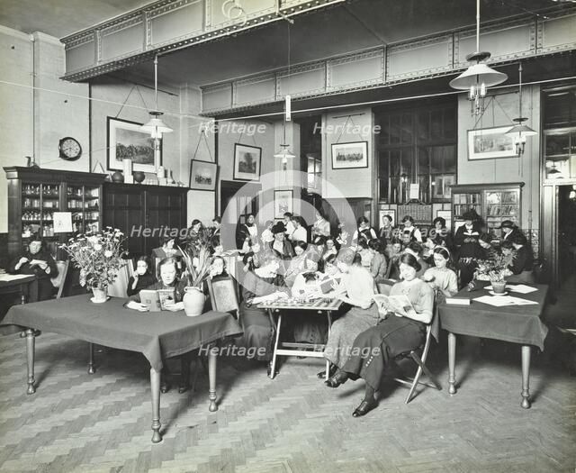 Relaxing in the Social Hall, Cosway Street Evening Institute for Women, London, 1914. Artist: Unknown.