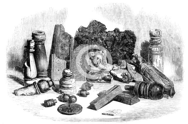 Relics from the Buried City of Brahmunabad, in Sind - Chessmen, Portion of Chess-board..., 1857. Creator: Unknown.