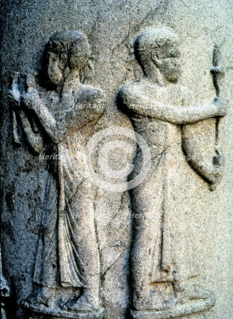 Relief of a priest in a granite column, now in the Capitoline Museum in Rome.