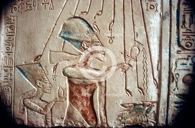 Relief of Akhenaten and Nefertiti under the rays of the sun-god Aten, Egyptian Museum:Cairo. Artist: Unknown