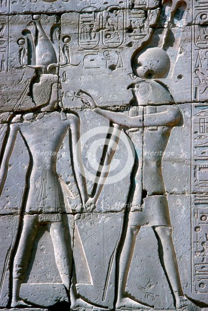 Relief of Amun-Ra giving life to Rameses II, Temple of Rameses II, Luxor, Egypt, c1250 BC. Artist: Unknown