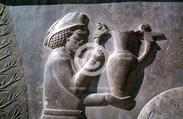 Relief of an Armenian man carrying a vessel, the Apadana, Persepolis, Iran